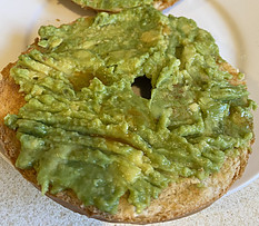 Mashed avocado on a bagel